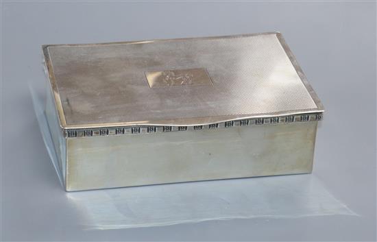 A modern silver cigarette box, by Cooper Brothers & Sons, Sheffield, 1973, 15cm.